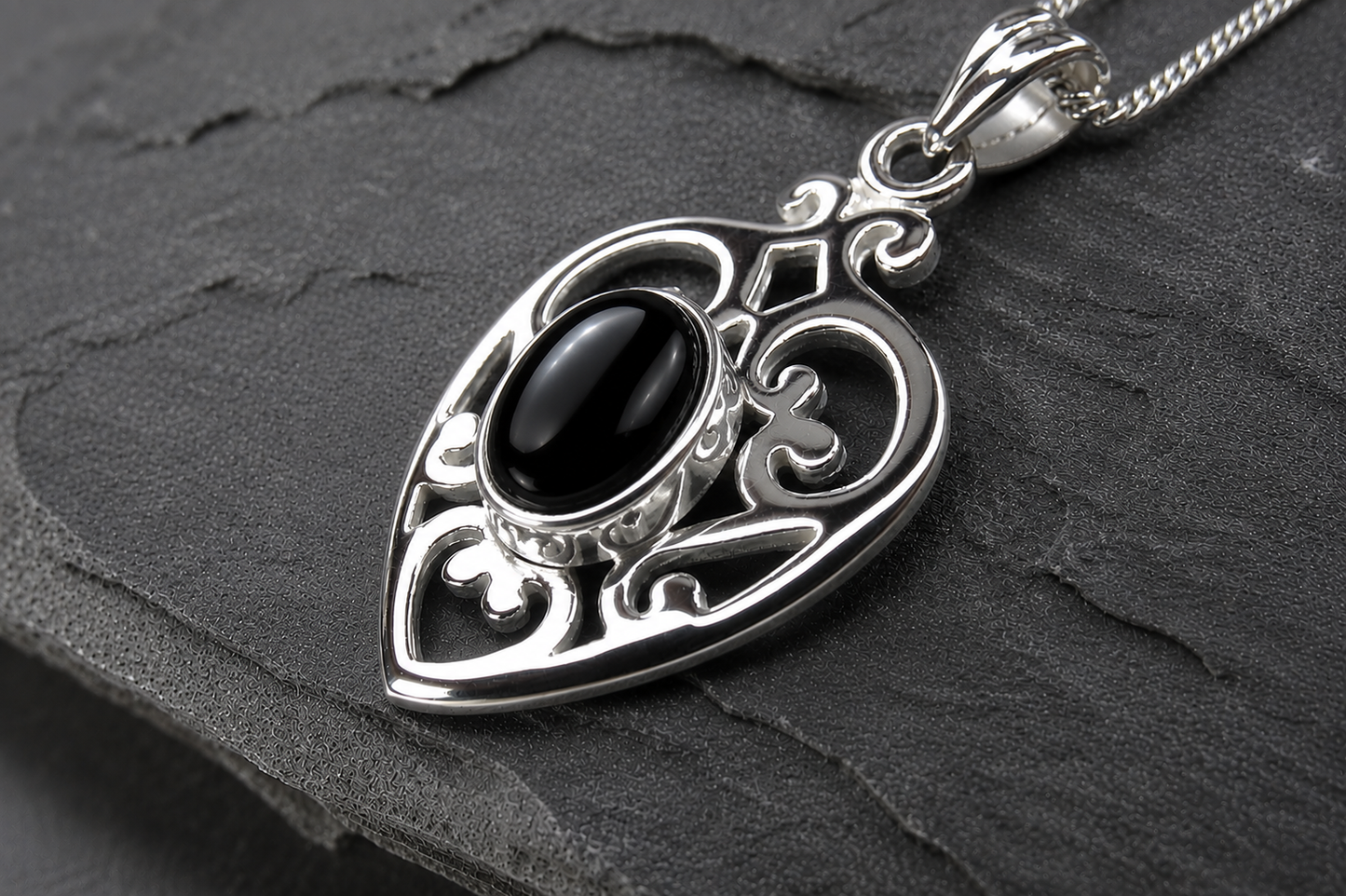Silver scrolled heart