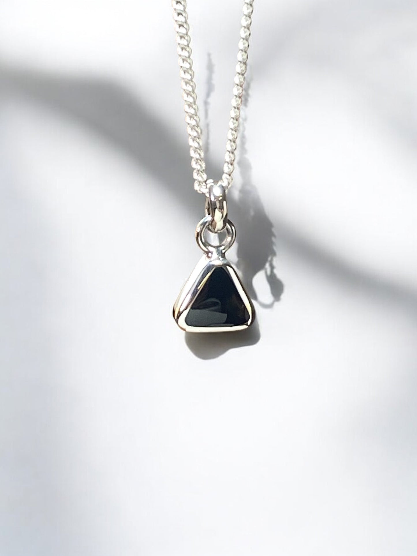 Triangular pendant