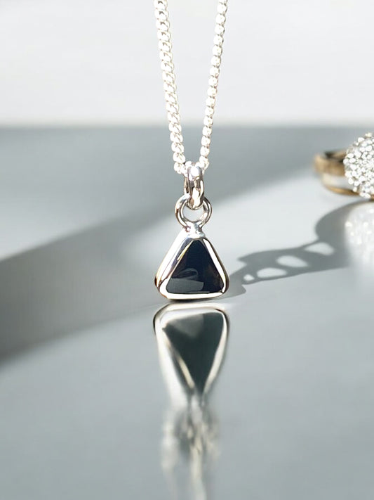 Triangular pendant