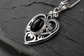 Silver scrolled heart