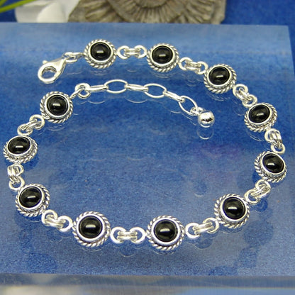 11 stone bracelet in Sterling silver inset with Whitby jet