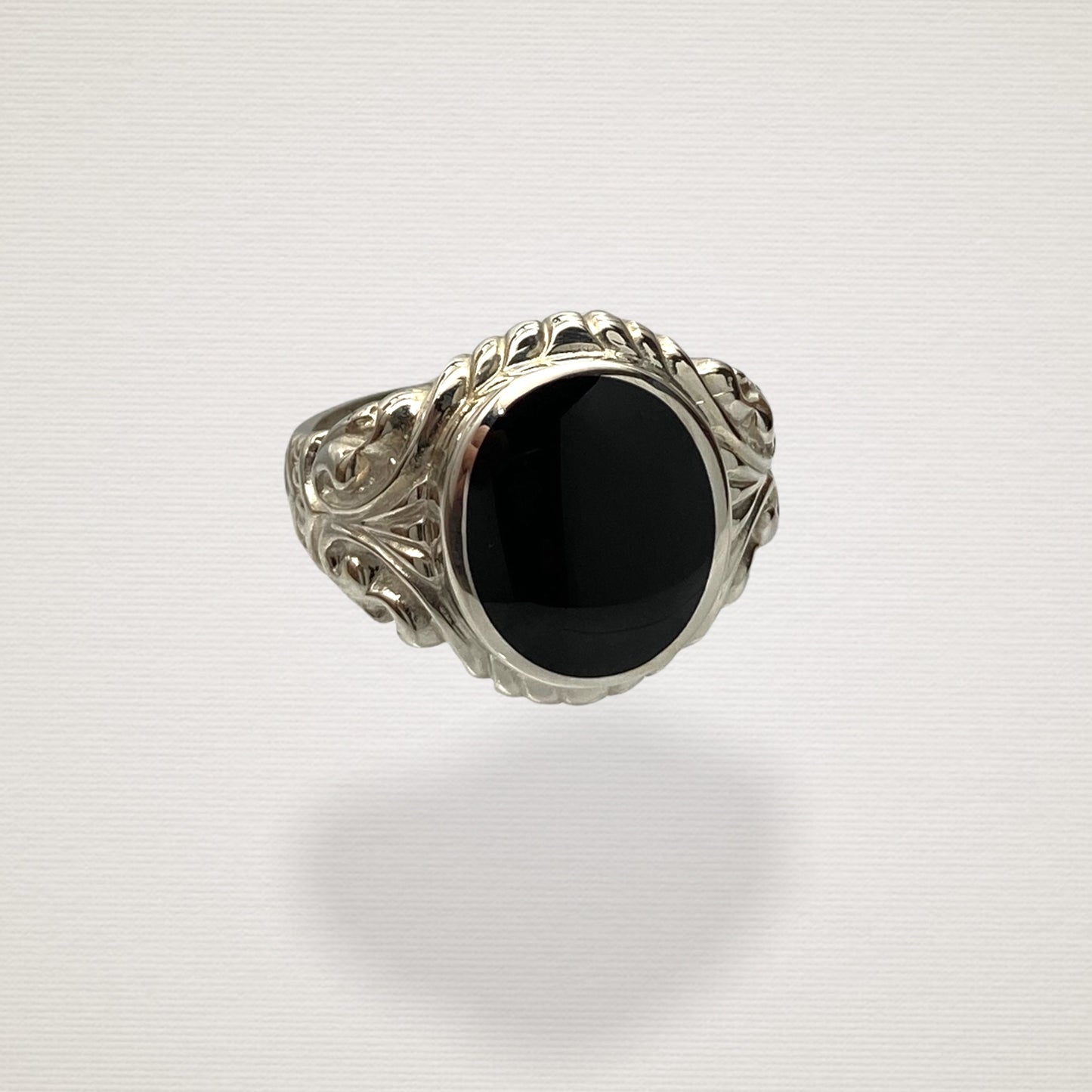 Scrolled oval ring
